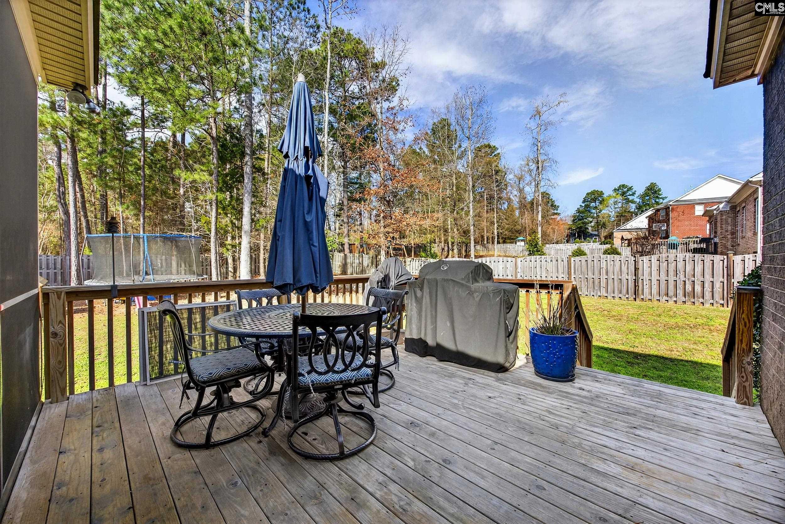 116 Renard Way Gilbert, SC 29054 - Photo 52 of 74 a view of a balcony with furniture and wooden floor