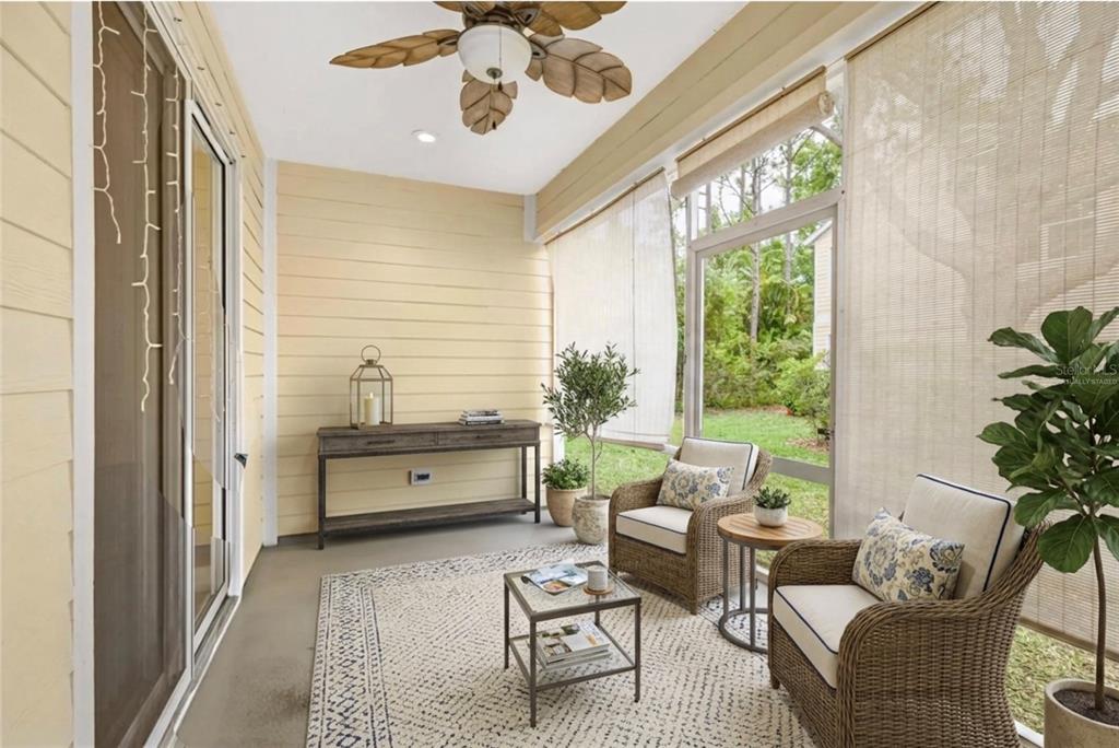 6216 Rosefinch Court, Unit 102 Lakewood Ranch, FL 34202 - Photo 25 of 45 a living room with furniture and a large window