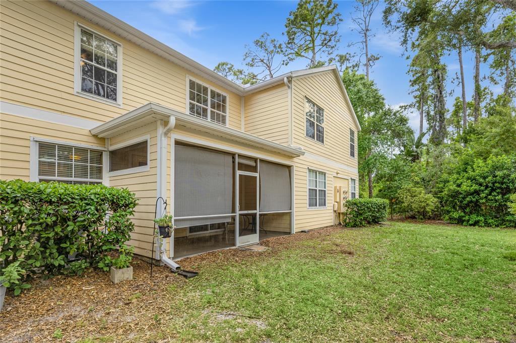 6216 Rosefinch Court, Unit 102 Lakewood Ranch, FL 34202 - Photo 28 of 45 front view of a house with a yard