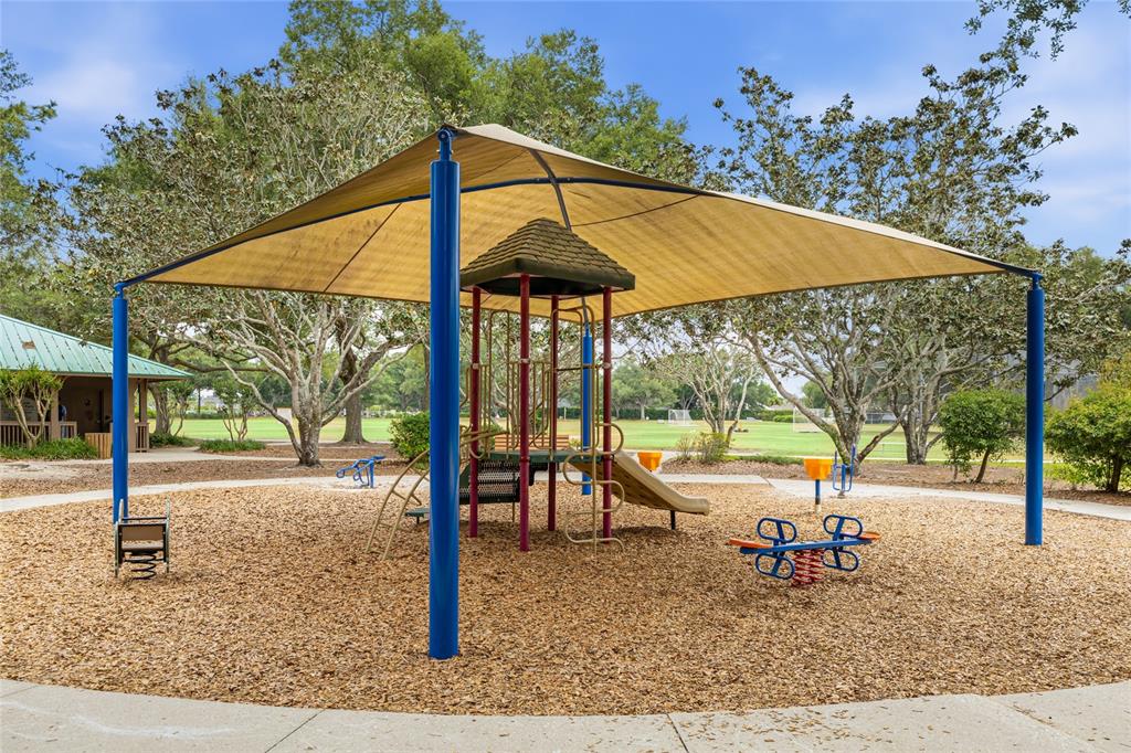 6216 Rosefinch Court, Unit 102 Lakewood Ranch, FL 34202 - Photo 30 of 45 swimming pool view with a outdoor seating