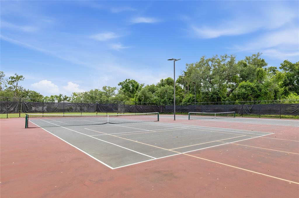 6216 Rosefinch Court, Unit 102 Lakewood Ranch, FL 34202 - Photo 31 of 45 a view of a tennis court