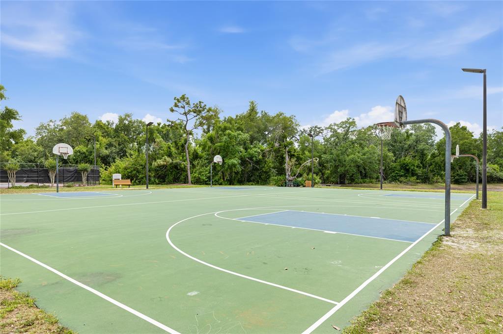 6216 Rosefinch Court, Unit 102 Lakewood Ranch, FL 34202 - Photo 32 of 45 a view of a tennis court