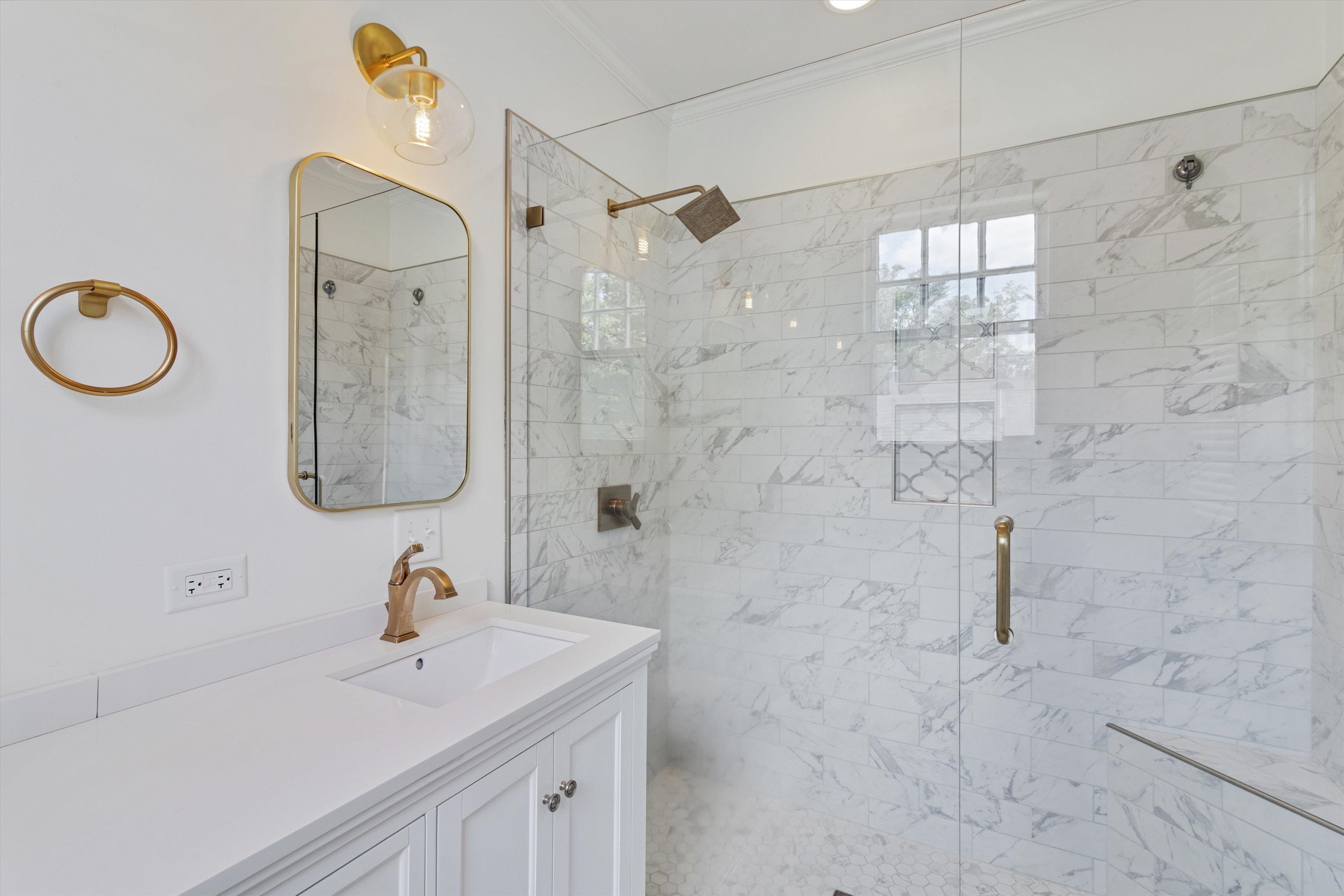 2346 North Strathmore Circle Memphis, TN 38112 - Photo 24 of 40 a bathroom with a sink and a mirror