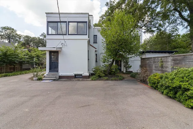 a view of a house with a street