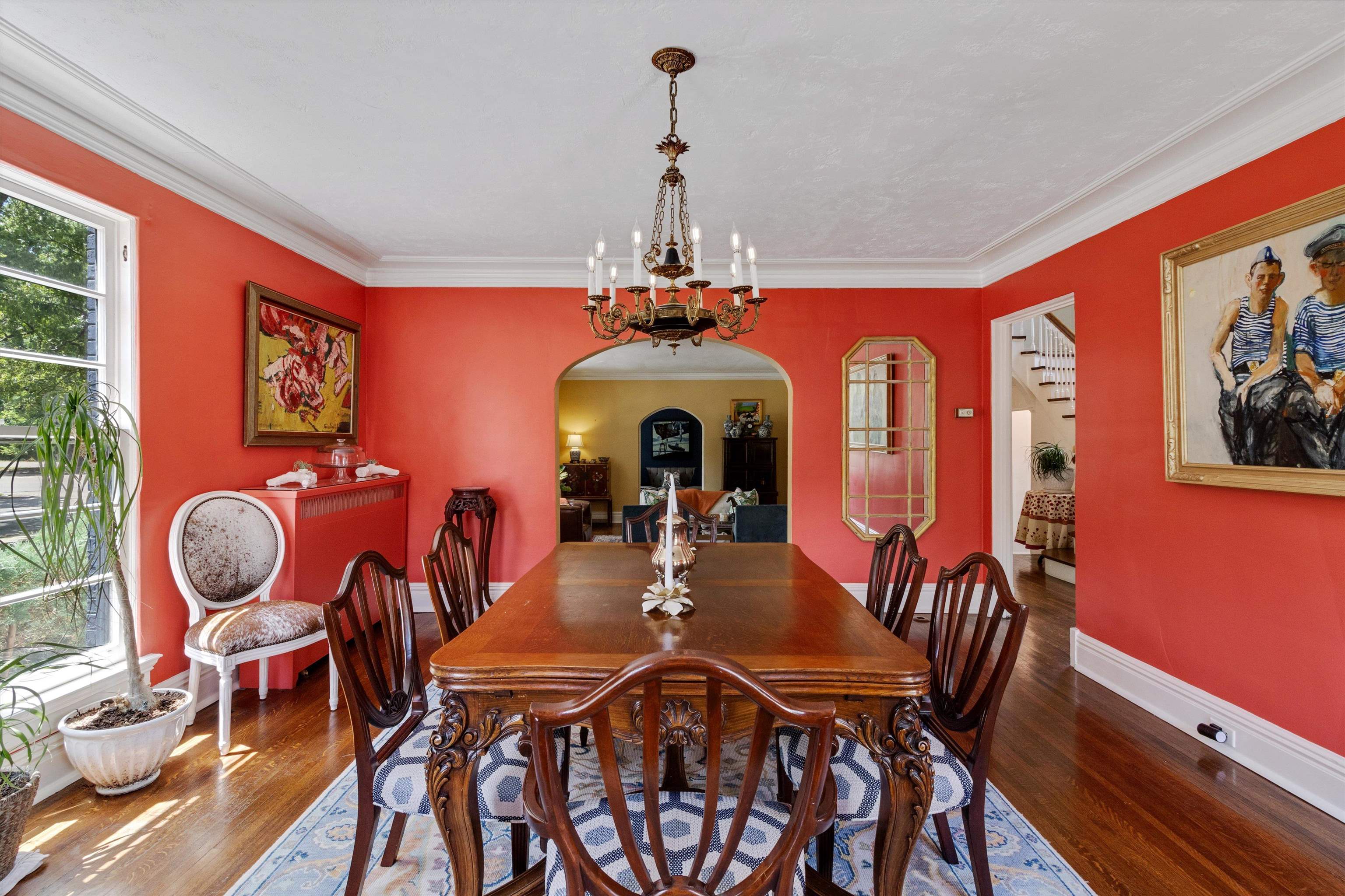 2346 North Strathmore Circle Memphis, TN 38112 - Photo 31 of 40 a view of a dining room with furniture wooden floor and chandelier