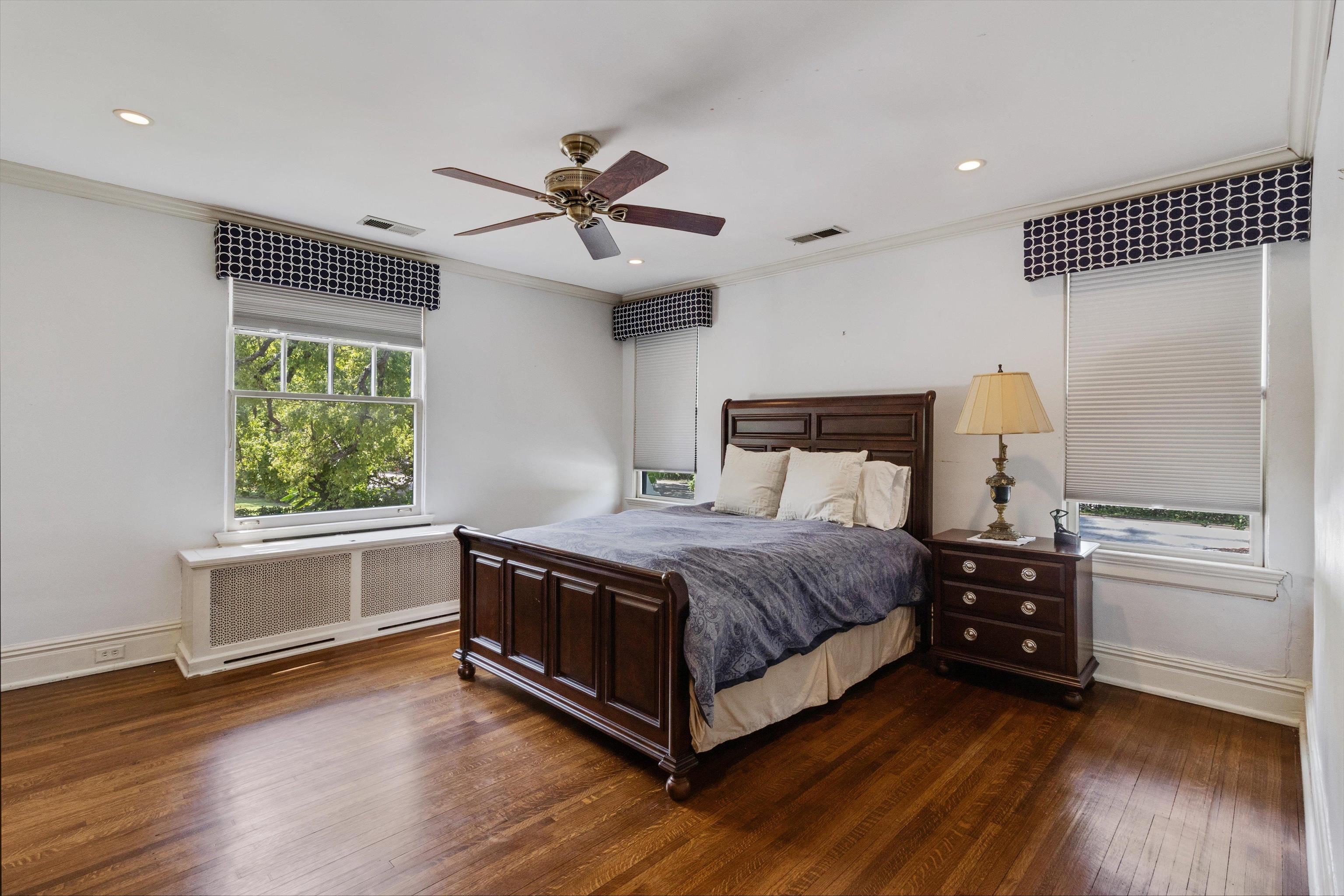 2346 North Strathmore Circle Memphis, TN 38112 - Photo 5 of 40 a bedroom with a bed and a window