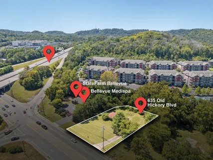 an aerial view of residential house with outdoor space