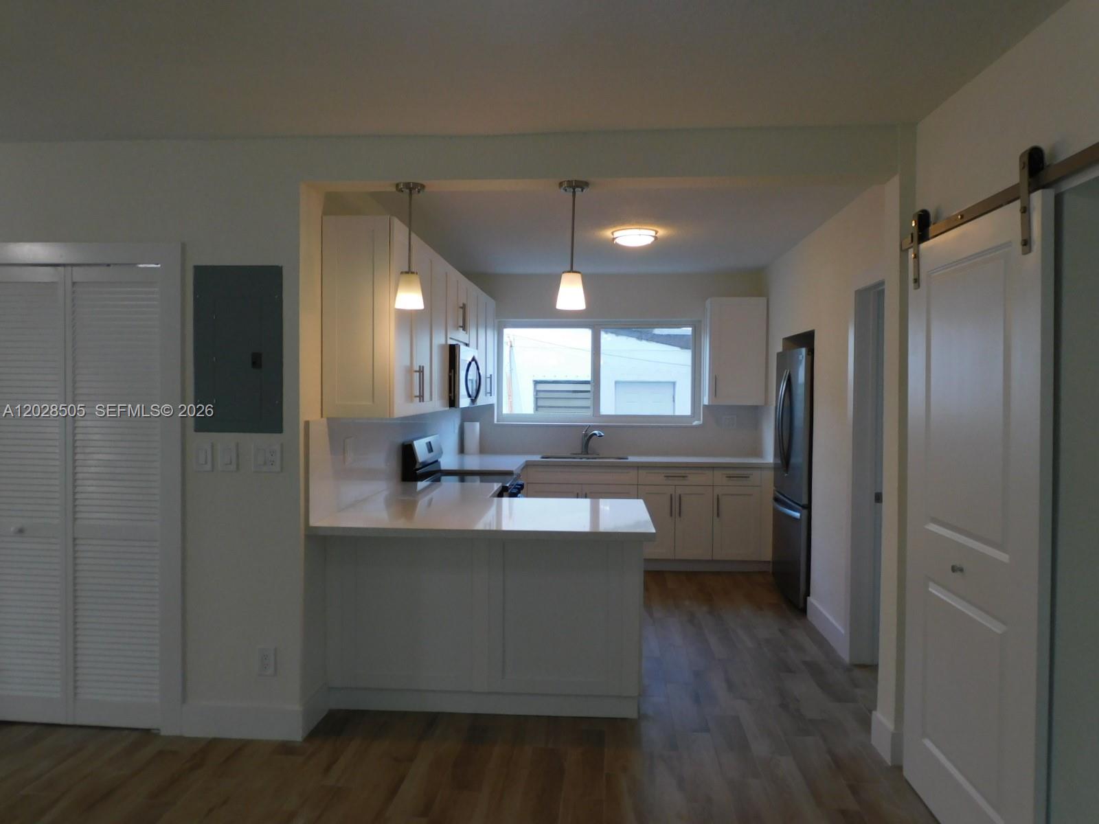 3333 Southwest 89th Avenue Miami, FL 33165 - Photo 16 of 44 Kitchen sits right off dining area.