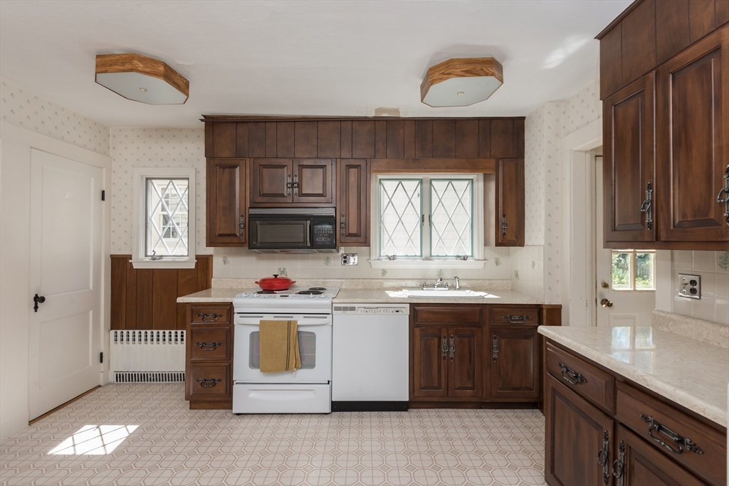 23 Argyle Road Arlington, MA 02476 - Photo 14 of 39 a kitchen with a sink and cabinets