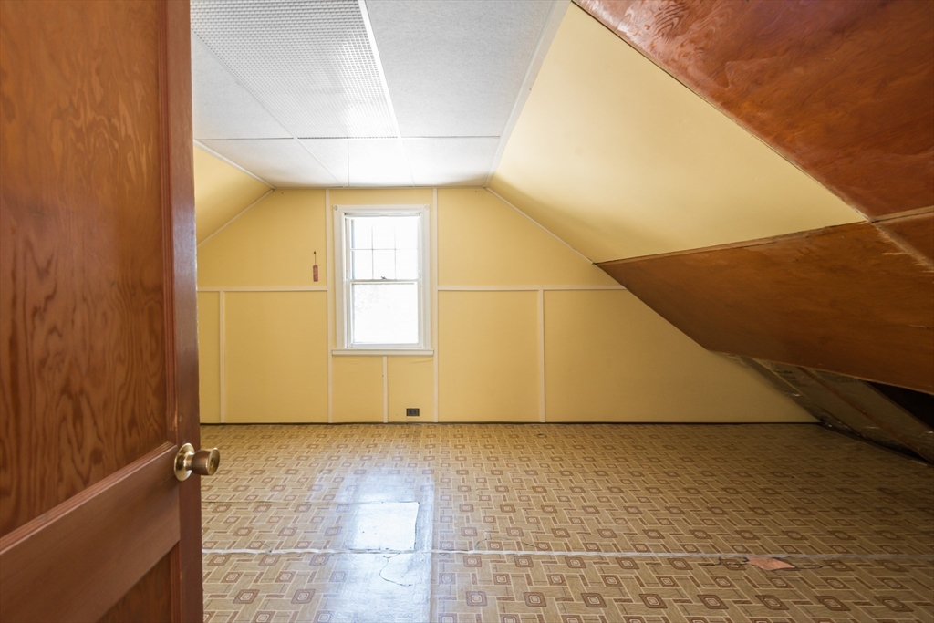 23 Argyle Road Arlington, MA 02476 - Photo 29 of 39 a view of a room with an empty space and a window