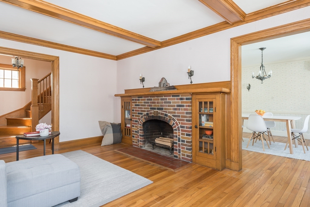23 Argyle Road Arlington, MA 02476 - Photo 10 of 39 a living room with furniture and a fireplace
