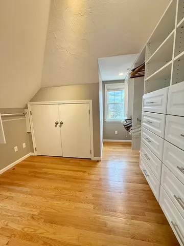 a view of a livingroom with wooden floor