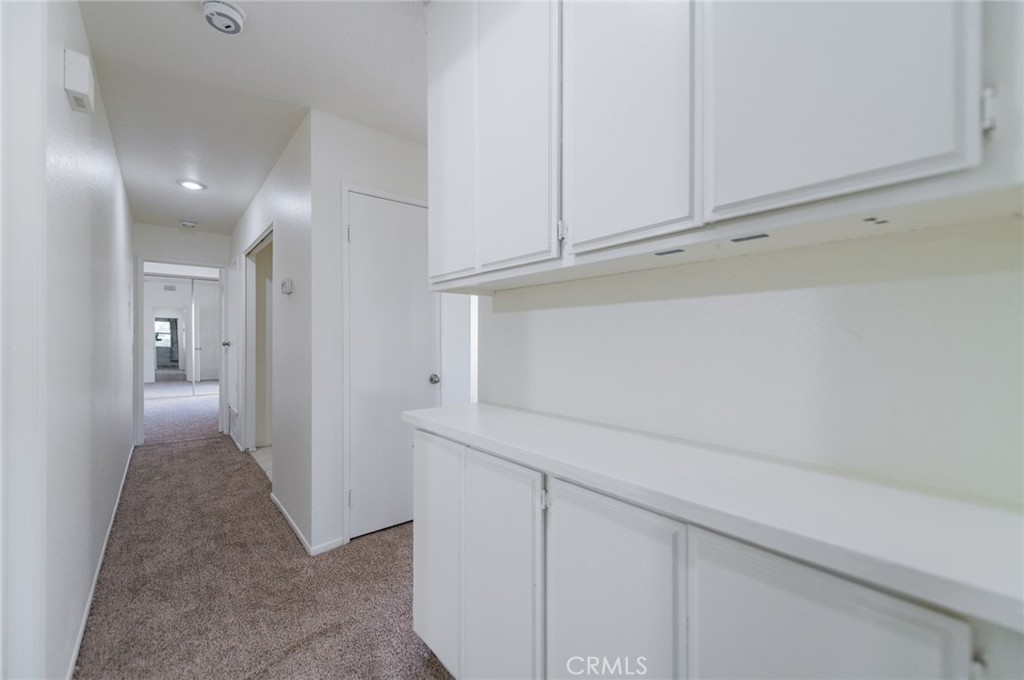 527 Springbrook North Irvine, CA 92614 - Photo 13 of 24 a view of a hallway with closet