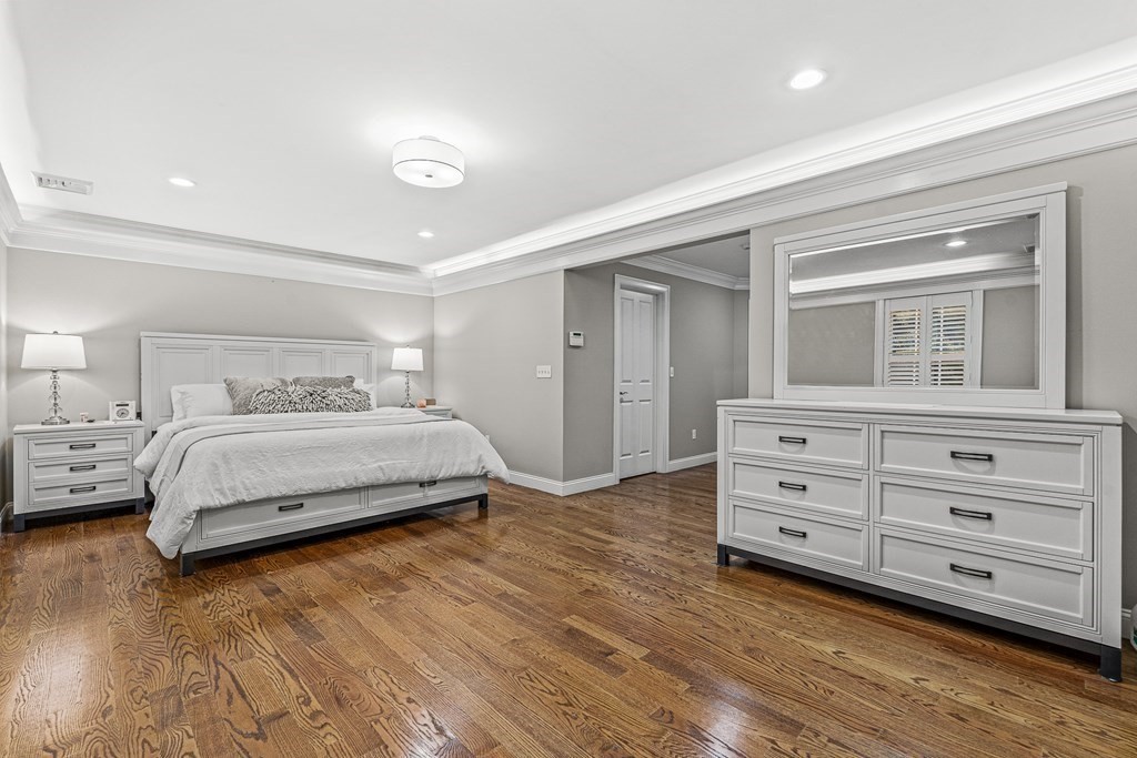 7 Pinevale Avenue Wellesley, MA 02482 - Photo 24 of 34 a bedroom with a bed and a dresser