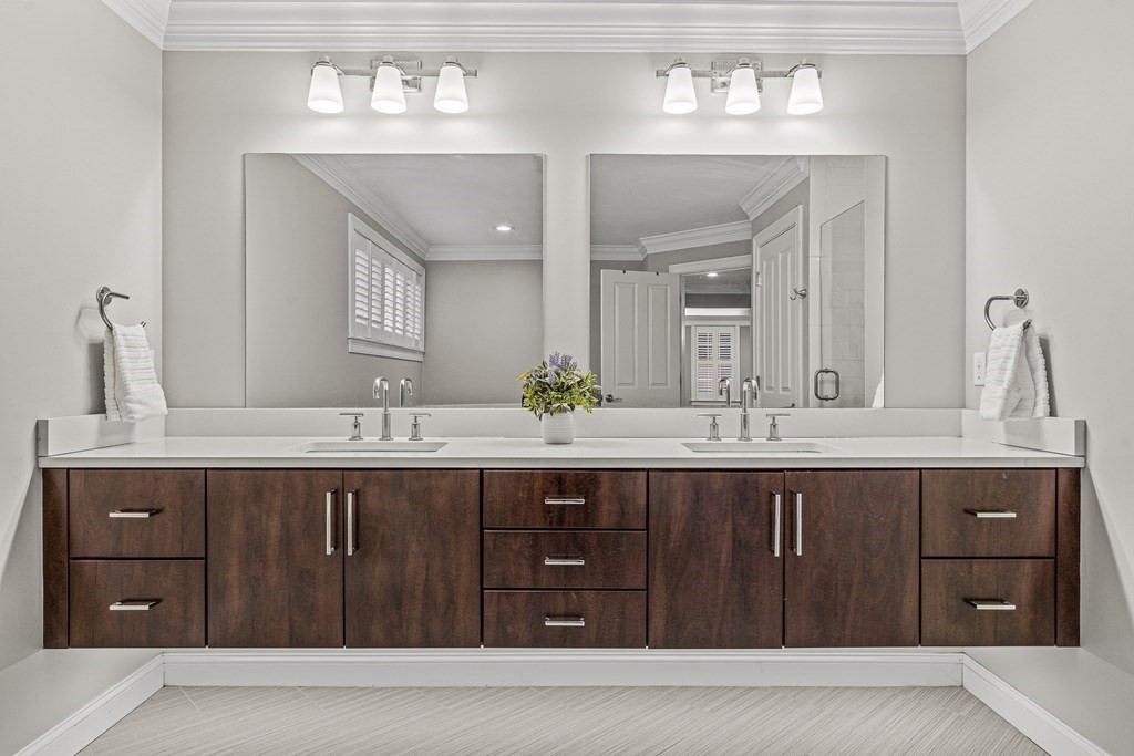 7 Pinevale Avenue Wellesley, MA 02482 - Photo 26 of 34 a bathroom with a sink double vanity and a mirror