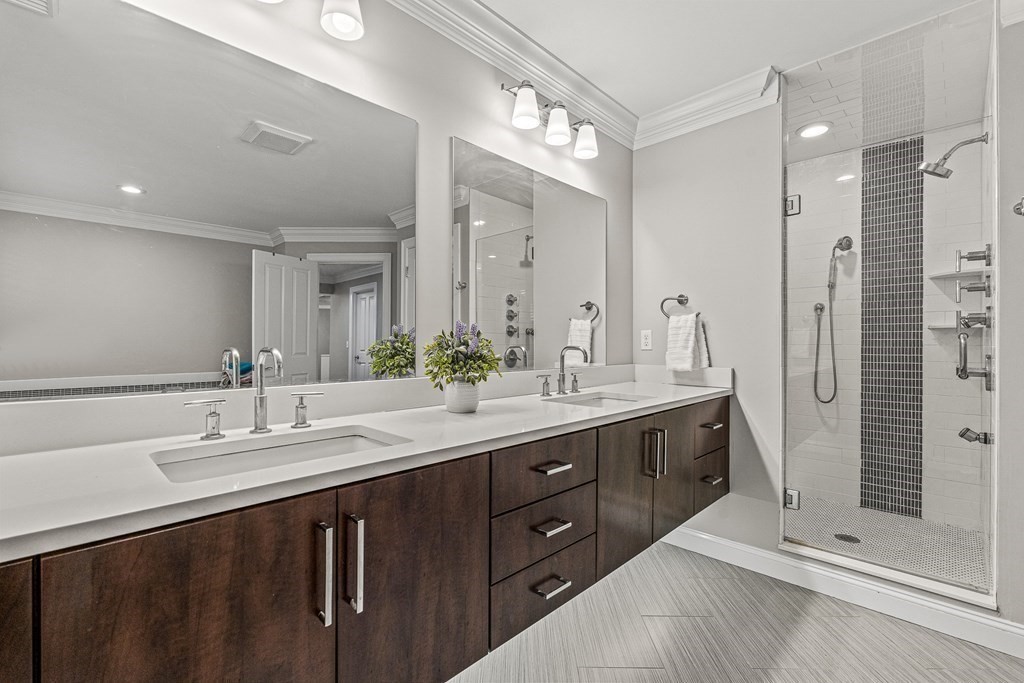 7 Pinevale Avenue Wellesley, MA 02482 - Photo 27 of 34 a bathroom with a sink double vanity and a shower