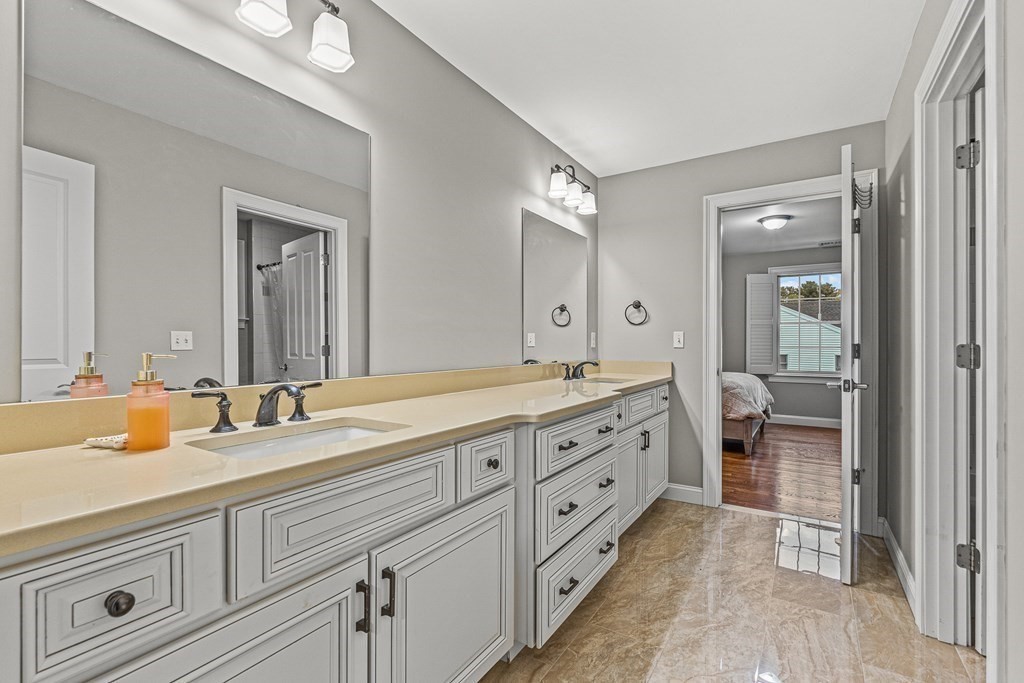 7 Pinevale Avenue Wellesley, MA 02482 - Photo 31 of 34 a spacious bathroom with double sink and a large mirror