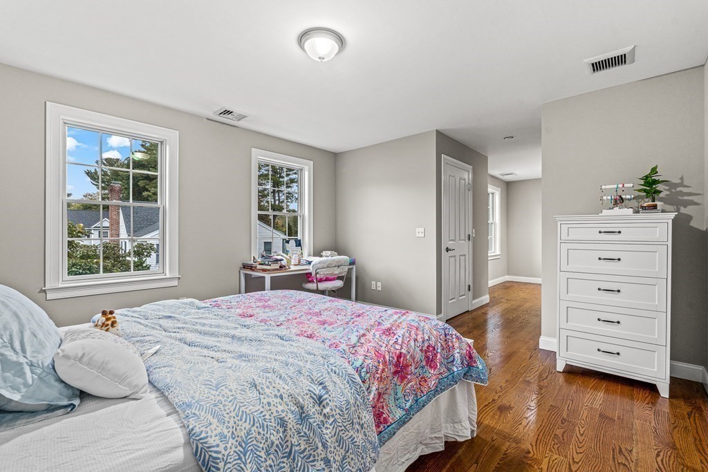7 Pinevale Avenue Wellesley, MA 02482 - Photo 32 of 34 a bedroom with a bed and a window