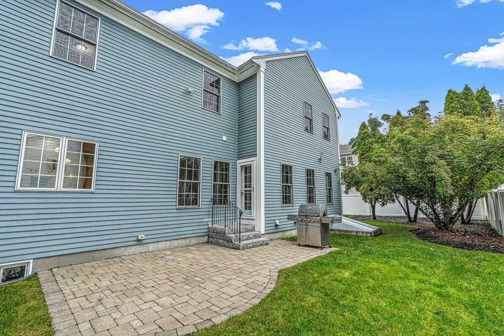7 Pinevale Avenue Wellesley, MA 02482 - Photo 33 of 34 a view of a house with a yard