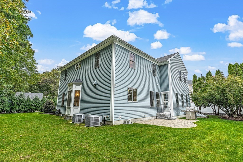 7 Pinevale Avenue Wellesley, MA 02482 - Photo 34 of 34 a house view with a swimming pool and garden