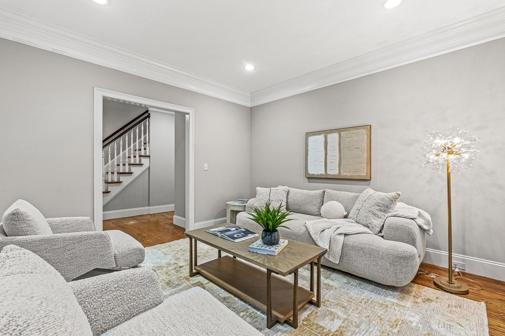 7 Pinevale Avenue Wellesley, MA 02482 - Photo 5 of 34 a living room with furniture and a lamp