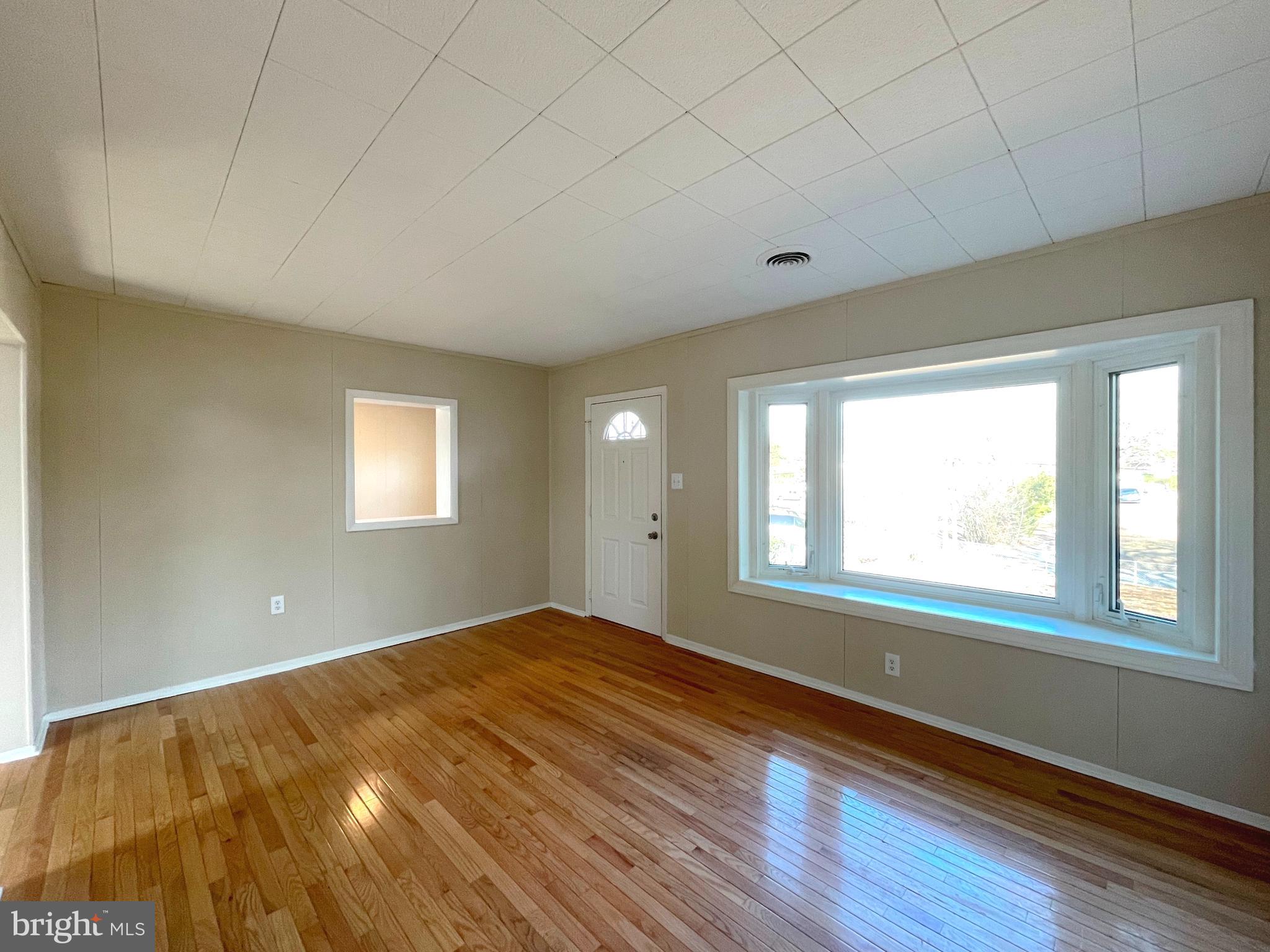 5377 Nelson Point Road Indian Head, MD 20640 - Photo 3 of 22 Living room w/hardwood floors and bay window
