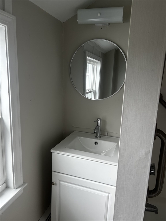 8 Beaver Dam Road, Unit B Scituate, MA 02066 - Photo 13 of 14 a utility room with dryer and washer