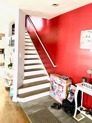 a view of an entryway with staircase