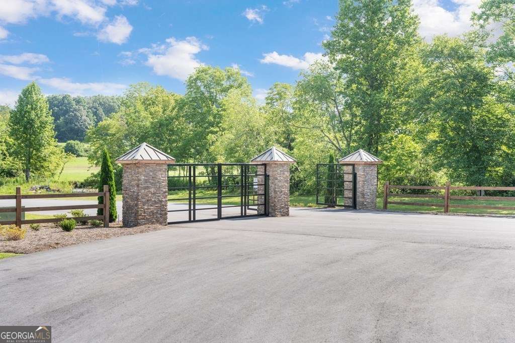 Lot 222 Ridge Drive Morganton, GA 30560 - Photo 8 of 8 a view of a house with a outdoor space