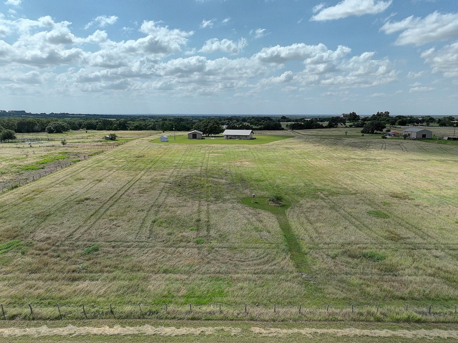 9414 Laird Road Round Top, TX 78954 - Photo 47 of 50 Back acreage fence line, partially fenced property utilized for hay production
