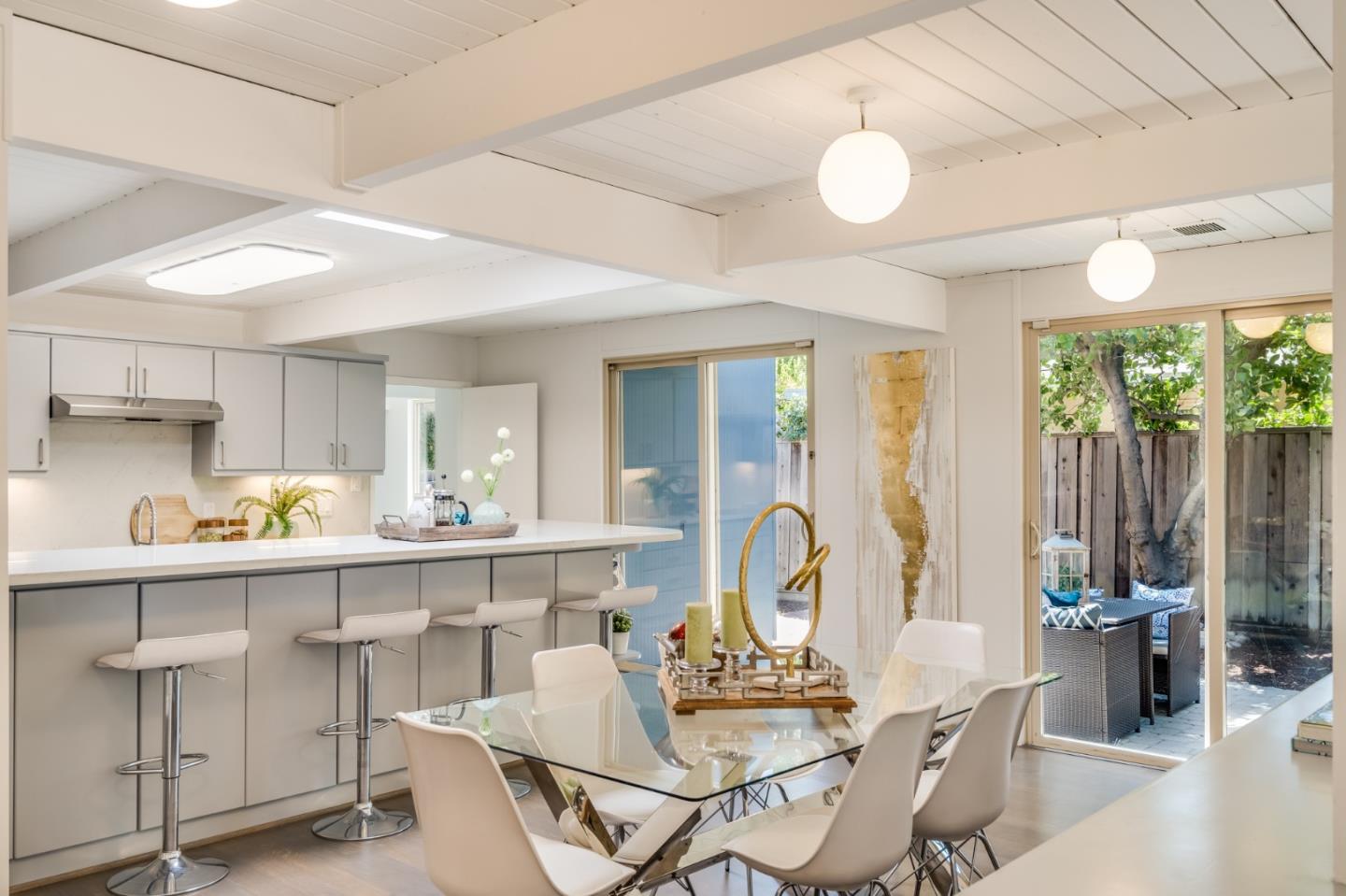 3924 Louis Road Palo Alto, CA 94303 - Photo 14 of 37 a view of a dining room with furniture window and outside view