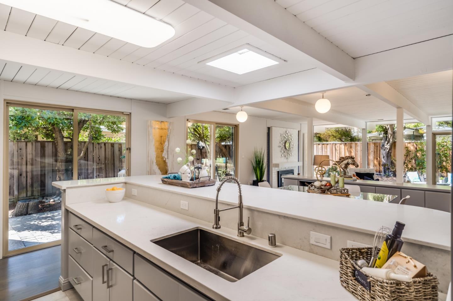 3924 Louis Road Palo Alto, CA 94303 - Photo 15 of 37 a view of a kitchen with a sink and large window