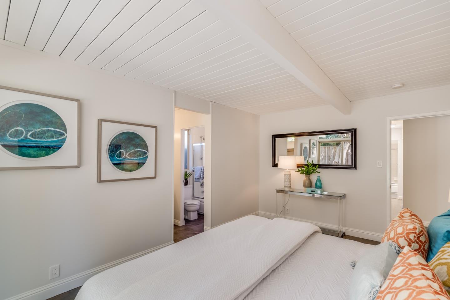 3924 Louis Road Palo Alto, CA 94303 - Photo 20 of 37 a bedroom with a bed and a window