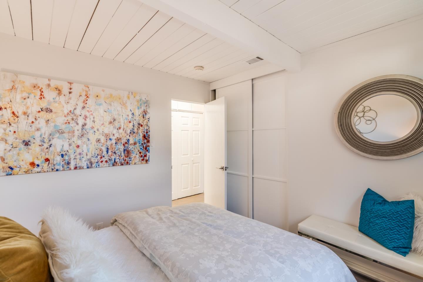 3924 Louis Road Palo Alto, CA 94303 - Photo 26 of 37 a bedroom with a bed and a window