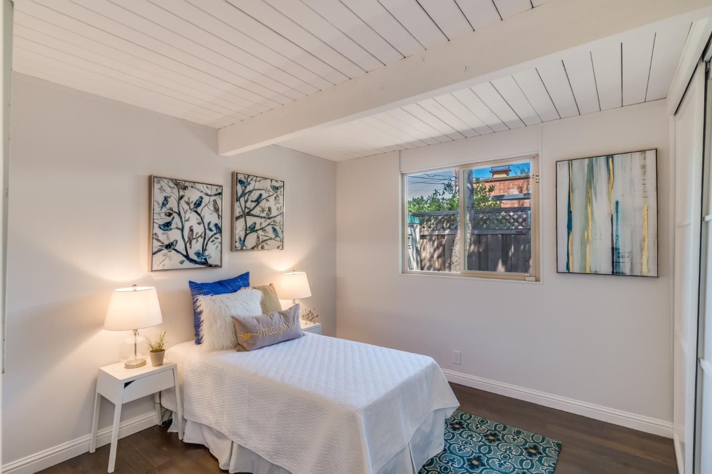3924 Louis Road Palo Alto, CA 94303 - Photo 28 of 37 a bedroom with a bed and a window