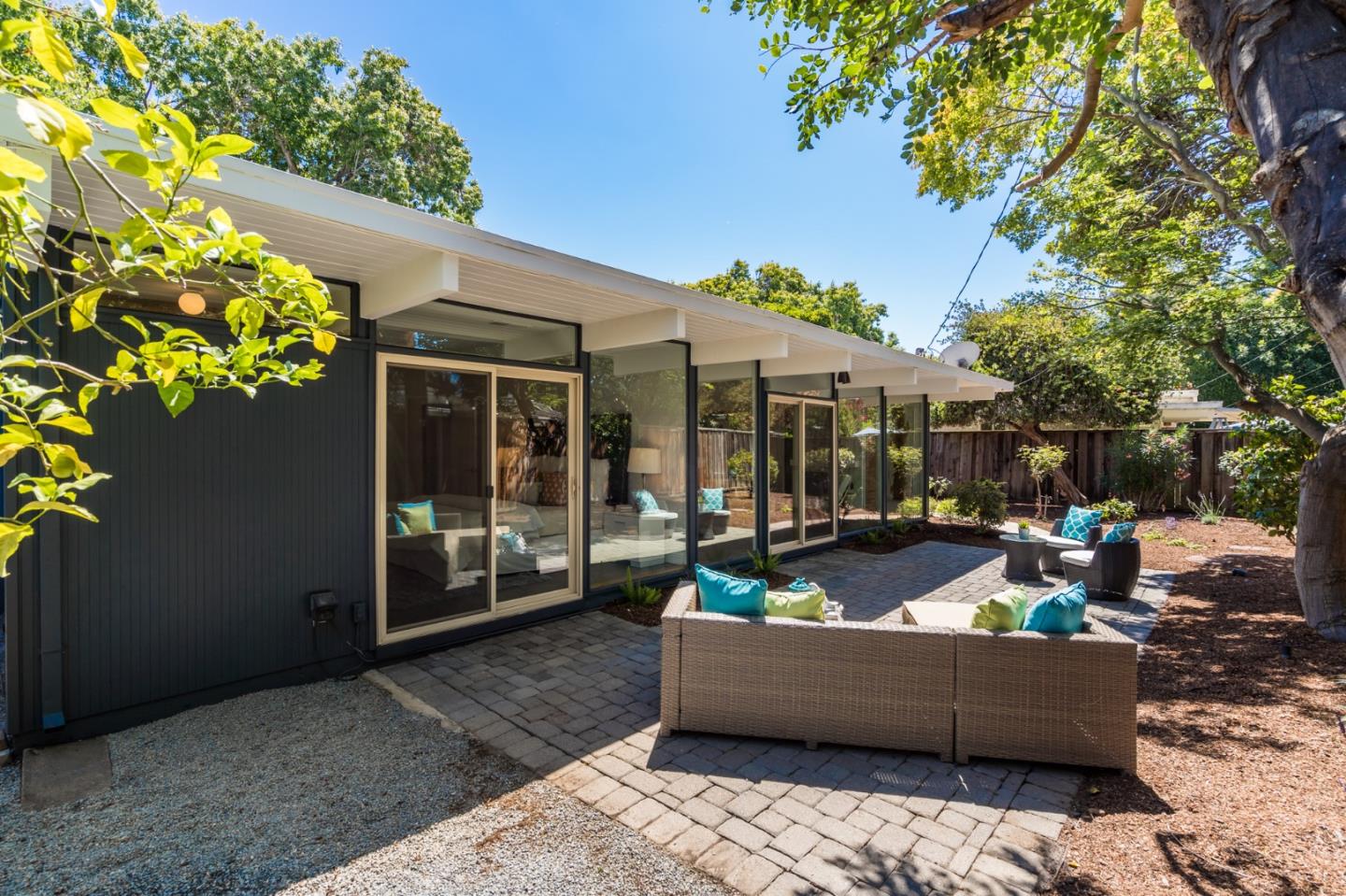 3924 Louis Road Palo Alto, CA 94303 - Photo 33 of 37 a view of an outdoor sitting area with a couch