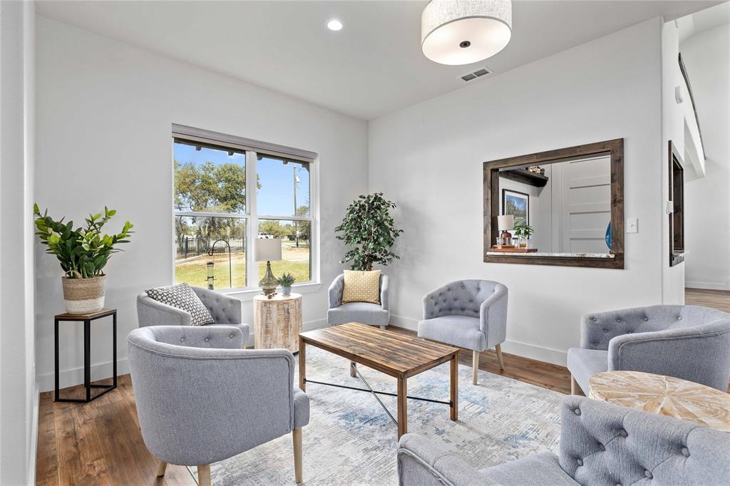 584 Oak Point Drive May, TX 76857 - Photo 16 of 40 a living room with furniture and a large window