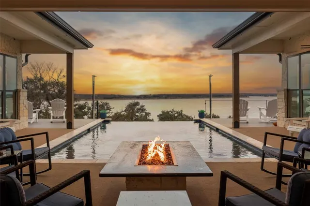 a front view of a house with a swimming pool