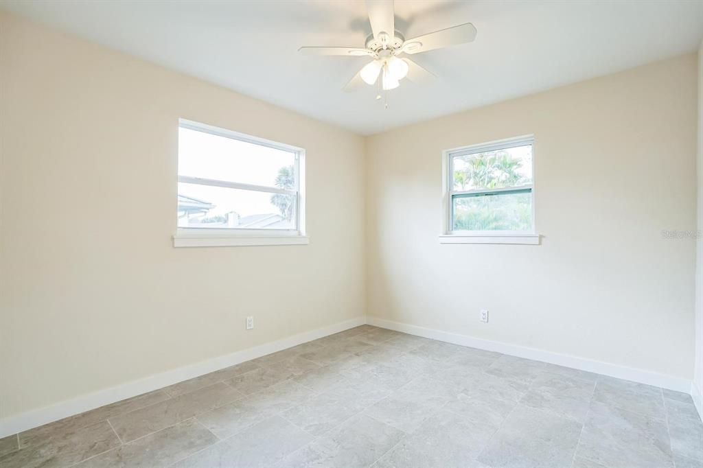 6064 Park Road Fort Myers, FL 33908 - Photo 11 of 14 an empty room with a window
