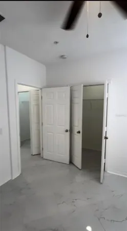 a swimming pool with outdoor seating and yard