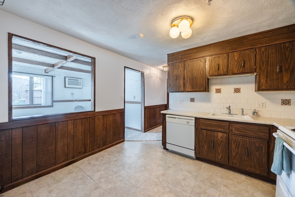 41 Spencer Road, Unit 26G Boxborough, MA 01719 - Photo 15 of 35 a kitchen with sink cabinets and window