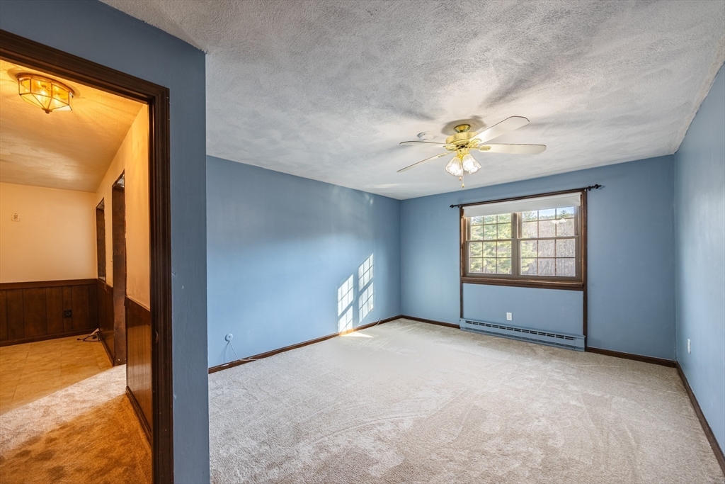41 Spencer Road, Unit 26G Boxborough, MA 01719 - Photo 21 of 35 a view of an empty room with a window
