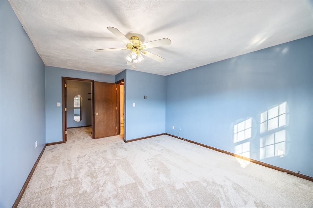 41 Spencer Road, Unit 26G Boxborough, MA 01719 - Photo 22 of 35 a view of an empty room with a window