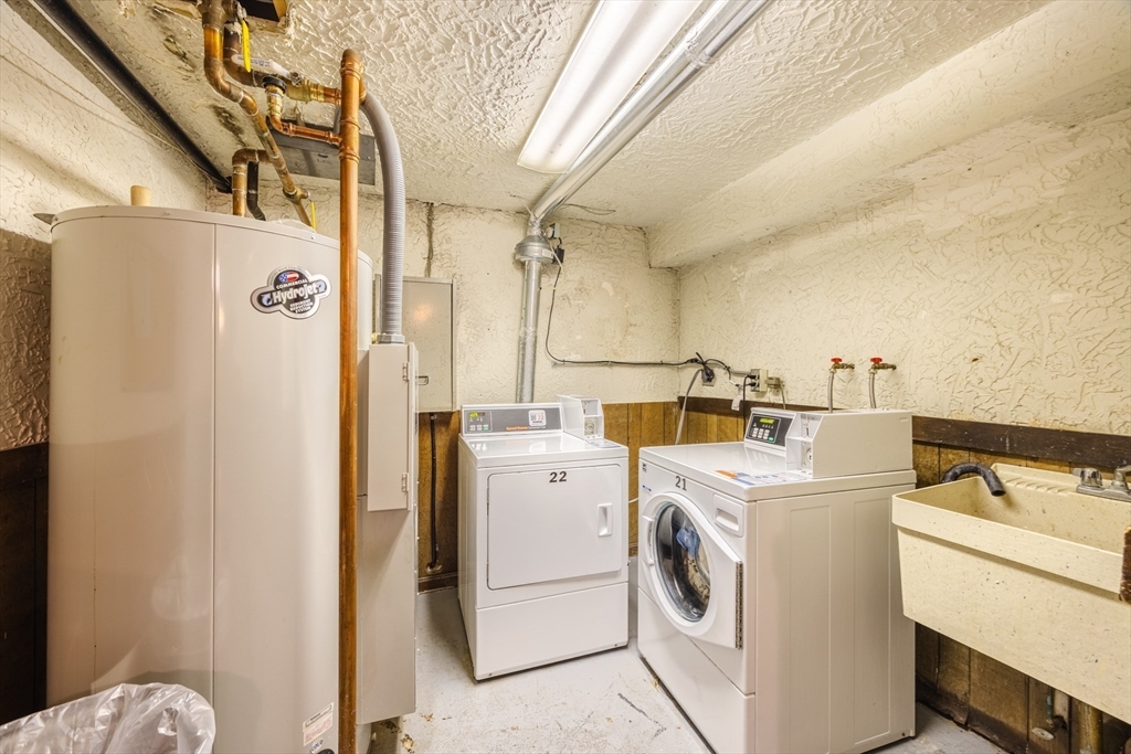 41 Spencer Road, Unit 26G Boxborough, MA 01719 - Photo 28 of 35 a utility room with dryer and washer