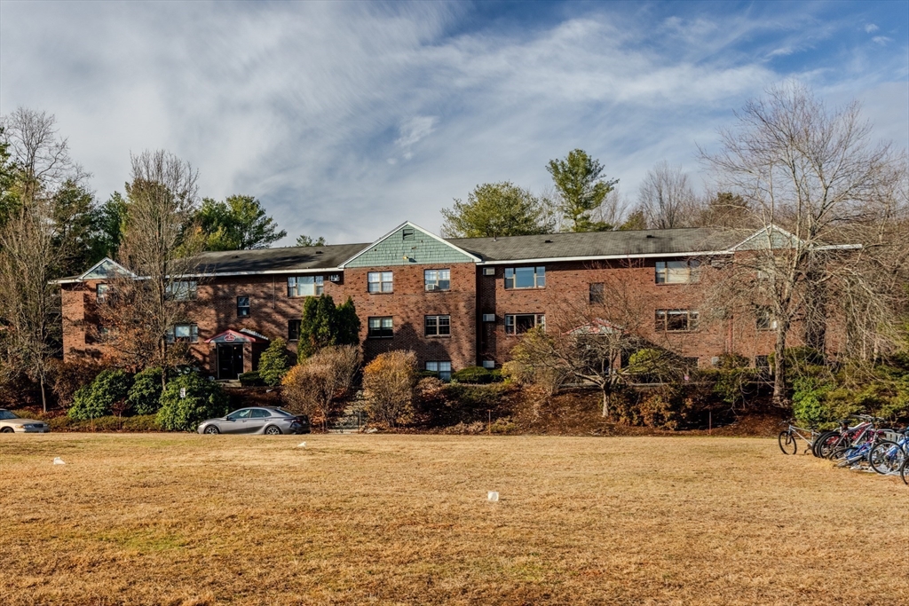 41 Spencer Road, Unit 26G Boxborough, MA 01719 - Photo 30 of 35 a view of swimming pool with outdoor seating