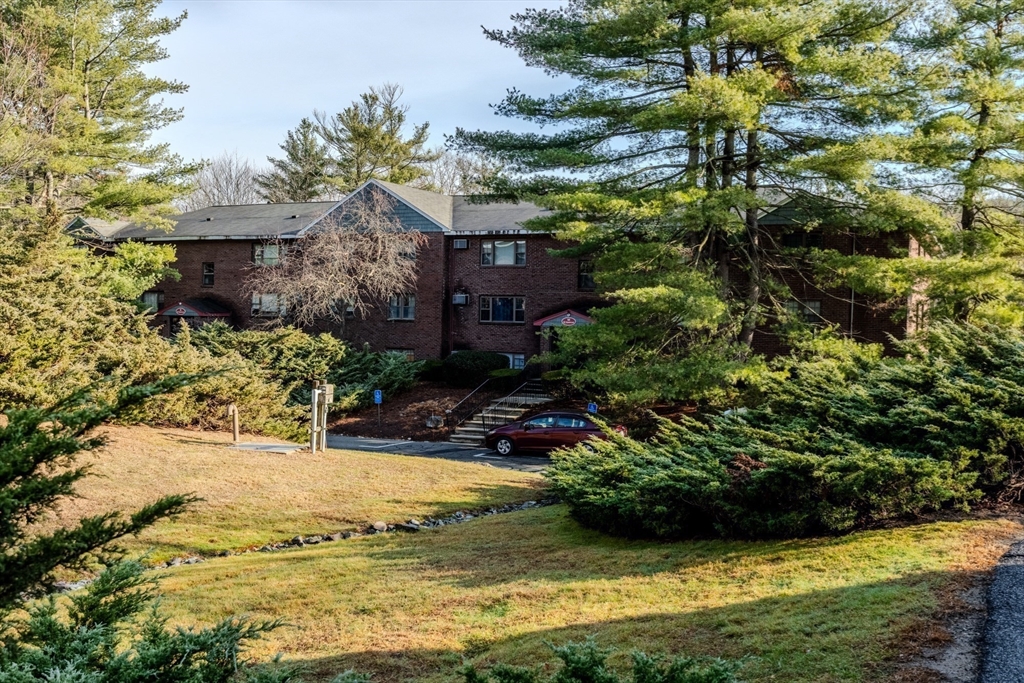 41 Spencer Road, Unit 26G Boxborough, MA 01719 - Photo 33 of 35 a view of swimming pool with a garden