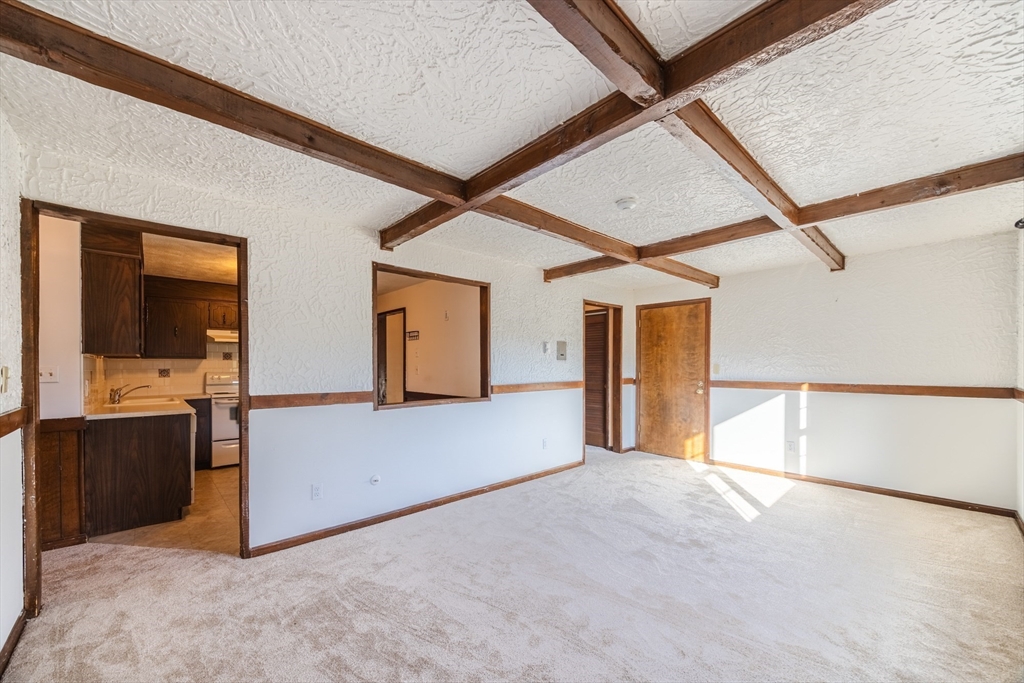 41 Spencer Road, Unit 26G Boxborough, MA 01719 - Photo 6 of 35 a view of a big room with closet and windows