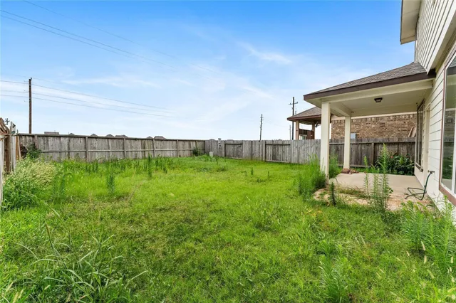 a view of a backyard with a garden