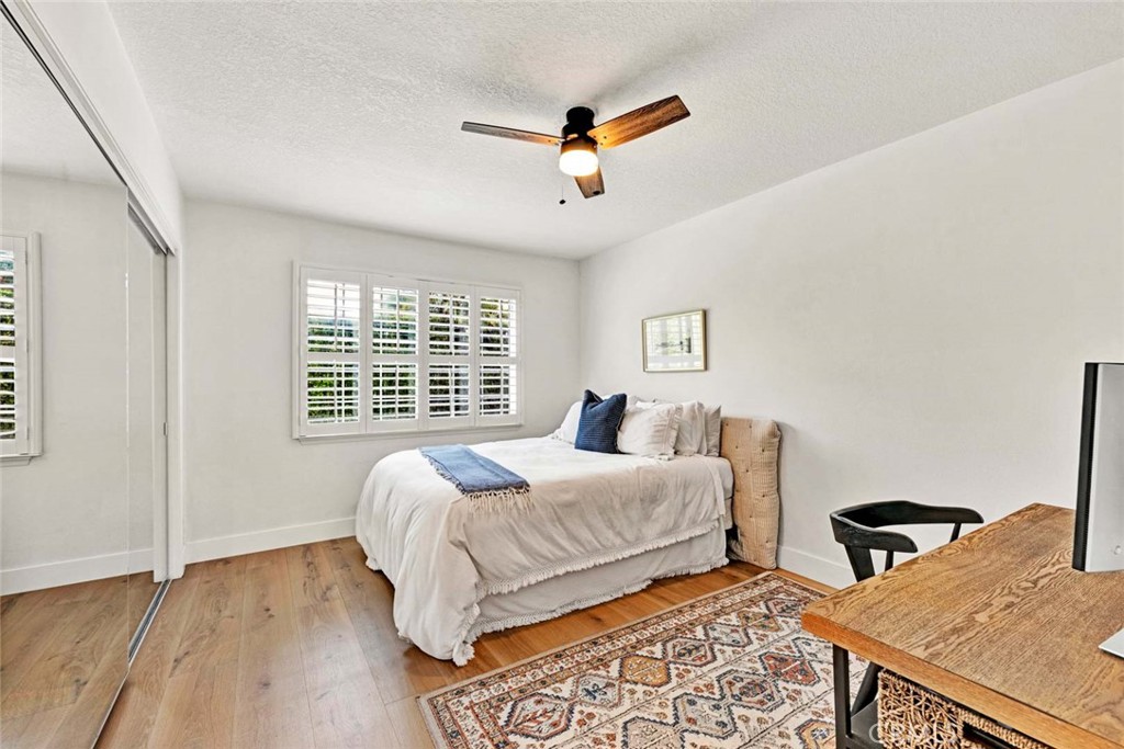 3210 Iowa Street Costa Mesa, CA 92626 - Photo 14 of 18 a bedroom with double bed and a window