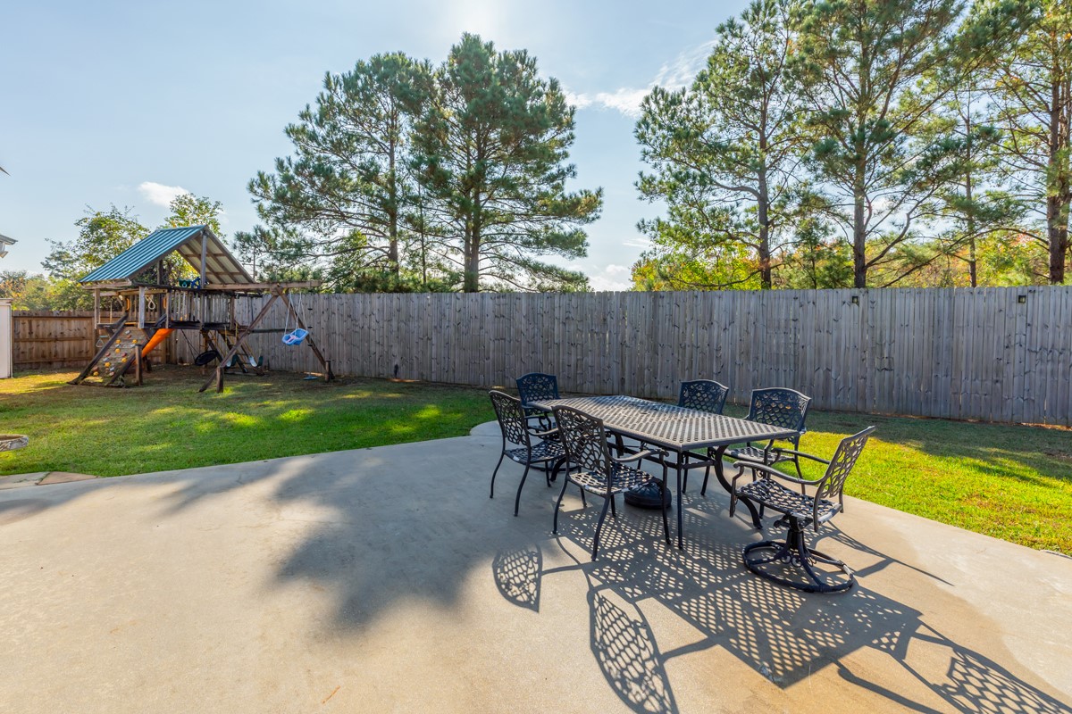 665 Winchester Drive Bridge City, TX 77611 - Photo 9 of 39 a view of yard with seating area and furniture